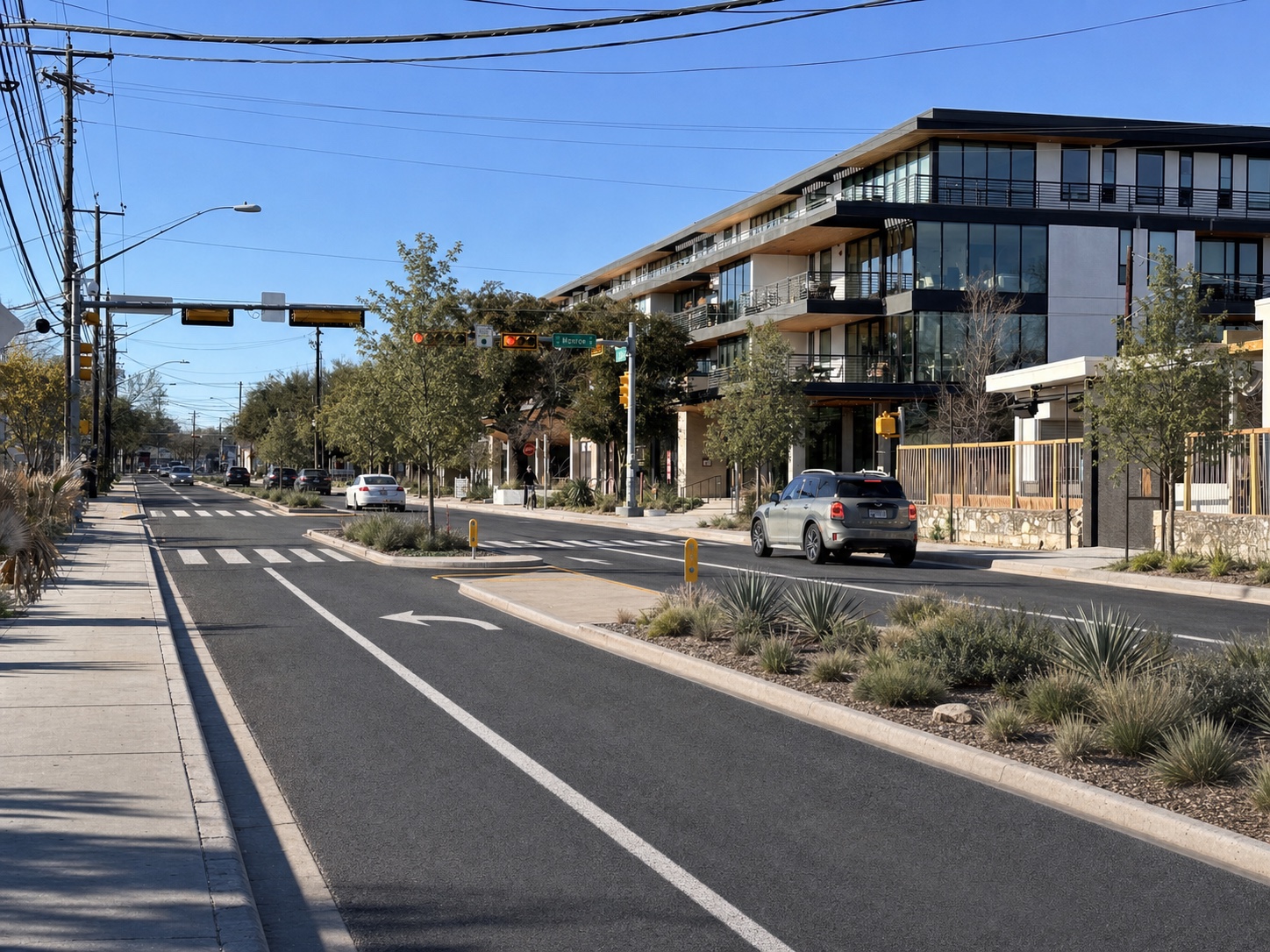 Conceptual rendering of South First with one through lane each way, a planted median, turn pockets, and pedestrian refuge